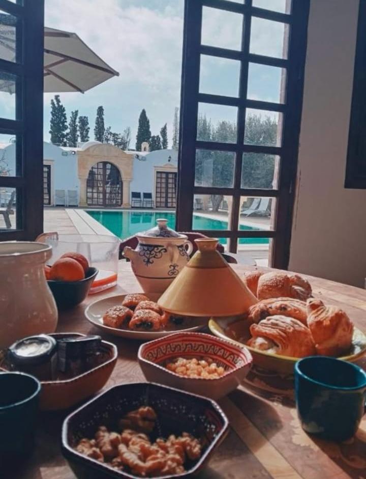 Overhead view of a shared Mediterranean mezze table