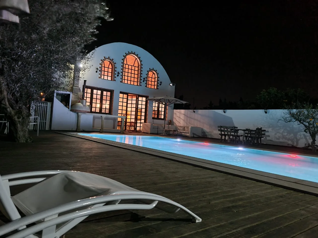 The courtyard pool at dusk at the Trinity Soul retreat property